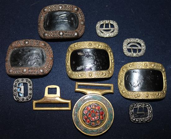 Nine assorted buckles.